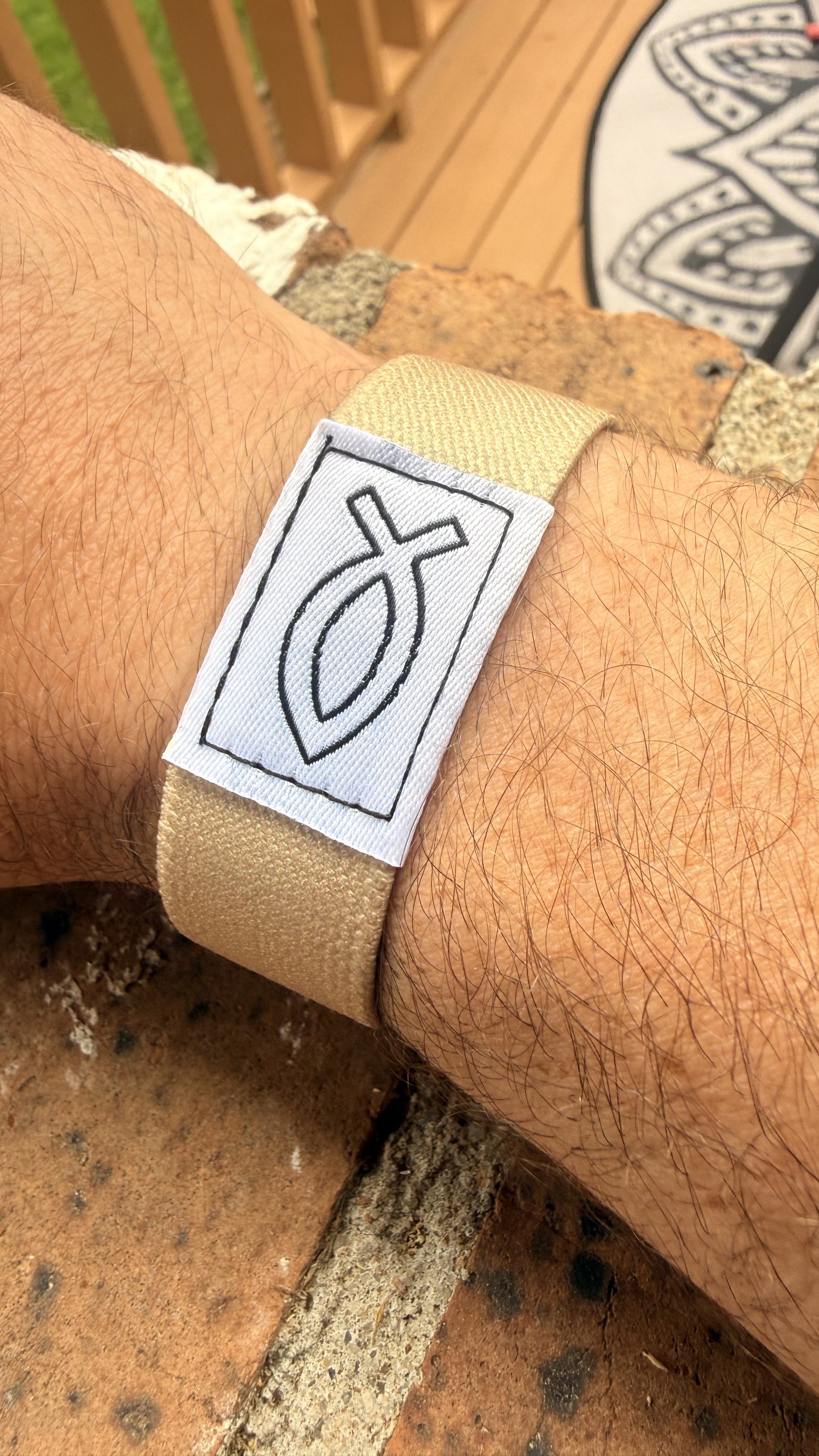 Close up of the Field Khaki Bible Band NFC wristband elastic band